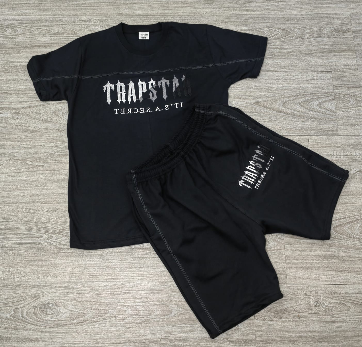 CONJUNTO TRAPSTAR POLERA SHORT 